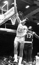 Ernie Grunfeld Jumping During Game
