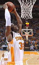 Crews Attempting To Score During Basketball Game