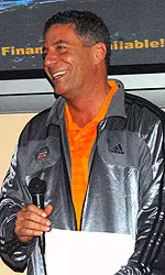 Pearl Smiling Holding Microphone