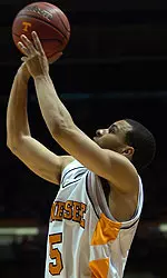 Lofton Jumping With Basketball