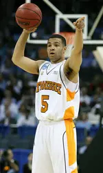 Chris Lofton Holding Basketball During Game