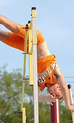 Holtz Jumping Over Bar