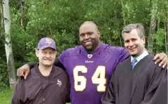 Anthony Herrera Posing With Two People