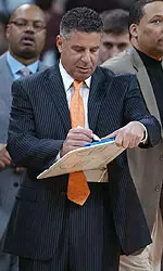 Pearl Standing Courtside Writing On Board