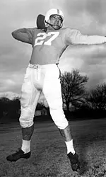 Hank Lauricella Standing On Field With Football