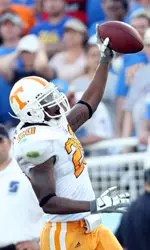 Nevin McKenzie scores a TD on one of four UT interceptions.