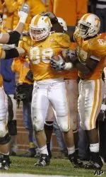 Luke Stocker (88) is congratulated by teammate Quintin Hancock (87).