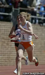 Phoebe Wright holds off Villanova's Sheila Reed for the victory in the 4x1500m relay.