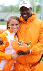 Shown with J.J. Clark on senior day, Liz Costello set an SEC meet record and won the 10,000 meters Friday night.
