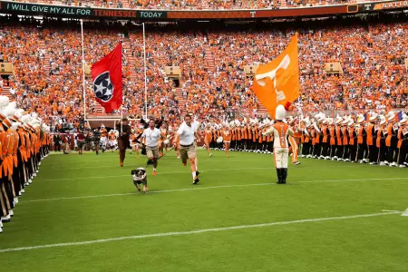 McMullen Handler Running With Smokey
