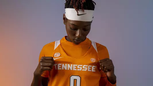 Rennia Davis lookng down