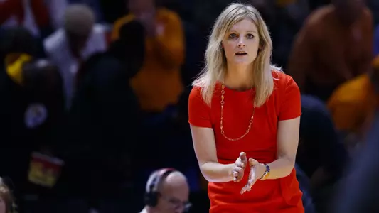 Kellie Harper clapping hands