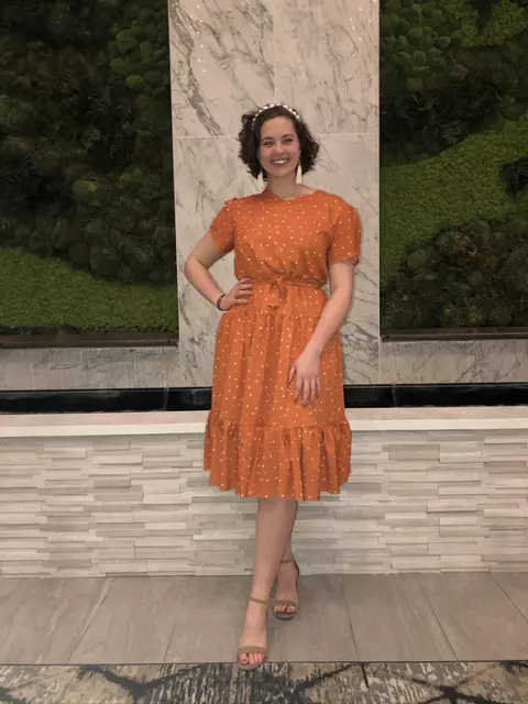 Person Posing In Front Of Marble Column