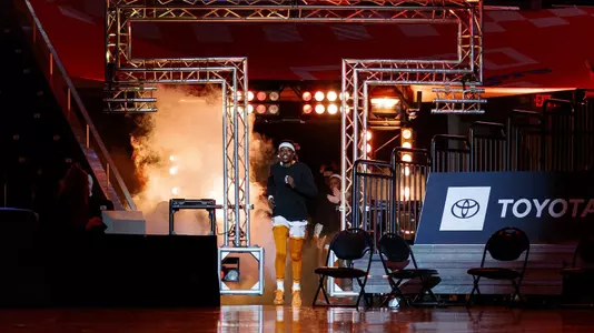 Rennia Davis running through the T