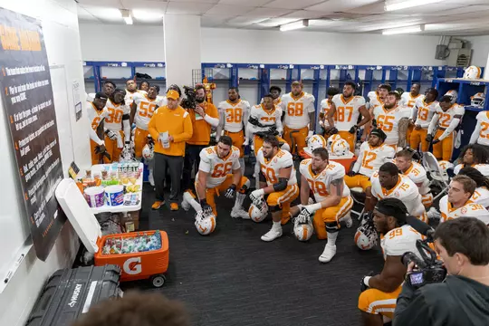 LEXINGTON, KY - November 06, 2021 - Head Coach Josh Heupel of the Tennessee Volunteers and the Tennessee Volunteers read General Neyland?s Game Maxims before the game between the Kentucky Wildcats and the Tennessee Volunteers at Kroger Field in Lexington, KY. Photo By Andrew Ferguson/Tennessee Athletics