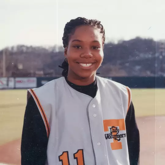 Athlete Standing On Field Smiling