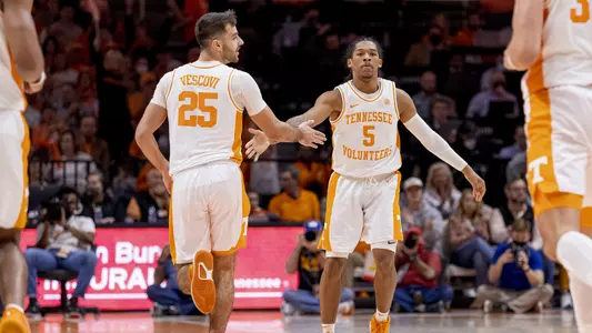 KNOXVILLE, TN - February 12, 2022 - Guard Santiago Vescovi #25 and Guard Zakai Zeigler #5 of the Tennessee Volunteers during the game between the Vanderbilt Commodores and the Tennessee Volunteers at Thompson?Boling Arena in Knoxville, TN. Photo By Andrew Ferguson/Tennessee Athletics
