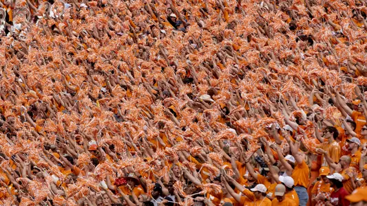 KNOXVILLE, TN - October 15, 2022 - Vol fans wave orange shakers during the game between the Alabama Crimson Tide and the Tennessee Volunteers at Neyland Stadium in Knoxville, TN. Photo By Andrew Ferguson/Tennessee Athletics
