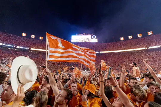 KNOXVILLE, TN - October 15, 2022 - Vol fans storm the field after the game between the Alabama Crimson Tide and the Tennessee Volunteers at Neyland Stadium in Knoxville, TN. Photo By Andrew Ferguson/Tennessee Athletics
