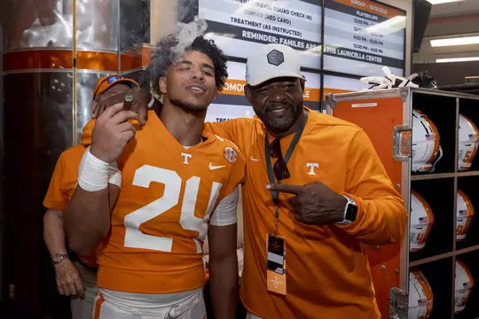KNOXVILLE, TN - October 15, 2022 - Linebacker Aaron Beasley #24 and VFL Al Wilson after the game between the Alabama Crimson Tide and the Tennessee Volunteers at Neyland Stadium in Knoxville, TN. Photo By Andrew Ferguson/Tennessee Athletics