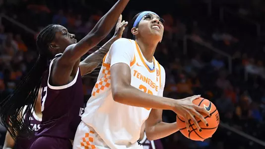 Tennessee center Tamari Key (20) looks to the basket while guarded by Eastern Kentucky guard/forward Antwainette Walker (13) during the NCAA college basketball game between the Tennessee Lady Vols and Western Kentucky Colonels on Sunday, November 27, 2022 in Knoxville Tenn.