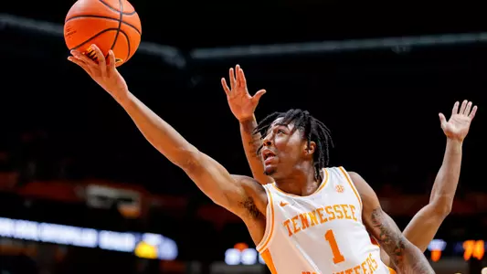 Tennessee basketball guard B.J. Edwards attempts a driving one-handed layup.