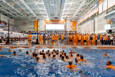 KNOXVILLE, TN - February 19, 2022 - The Tennessee Volunteers celebrate after winning the 2022 SEC Women?s Swimming and Diving championship after the day five finals session of the 2022 SEC Swimming and Diving Championships at Allan Jones Intercollegiate Aquatic Center in Knoxville, TN. Photo By Andrew Ferguson/Tennessee Athletics