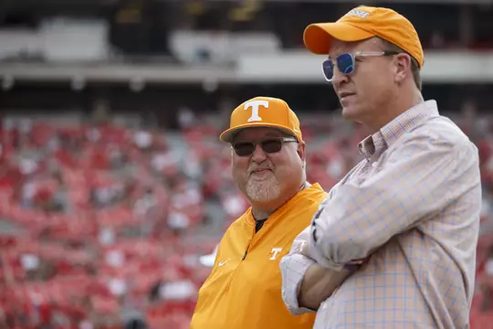 ATHENS, GA - SEPTEMBER 29, 2018 - Director of Equipment & Apparel Roger Frazier of the Tennessee Volunteers and VFL Peyton Manning before the game between the Georgia Bulldogs and the Tennessee Volunteers at Sanford Stadium in Athens, GA. Photo By Austin Perryman/Tennessee Athletics