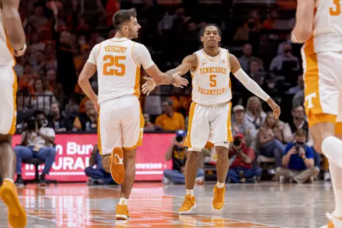 KNOXVILLE, TN - February 12, 2022 - Guard Santiago Vescovi #25 and Guard Zakai Zeigler #5 of the Tennessee Volunteers during the game between the Vanderbilt Commodores and the Tennessee Volunteers at Thompson?Boling Arena in Knoxville, TN. Photo By Andrew Ferguson/Tennessee Athletics