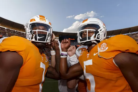 KNOXVILLE, TN - September 17, 2022 - Quarterback Joe Milton III #7 of the Tennessee Volunteers and Quarterback Hendon Hooker #5 of the Tennessee Volunteers before the game between the Akron Zips and the Tennessee Volunteers at Neyland Stadium in Knoxville, TN. Photo By Kate Luffman/Tennessee Athletics