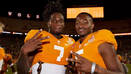 KNOXVILLE, TN - September 17, 2022 - Quarterback Joe Milton III #7 of the Tennessee Volunteers and Quarterback Hendon Hooker #5 of the Tennessee Volunteers after the game between the Akron Zips and the Tennessee Volunteers at Neyland Stadium in Knoxville, TN. Photo By Kate Luffman/Tennessee Athletics