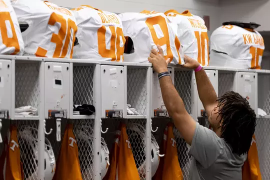 GAINESVILLE, FL - September 25, 2021 - Student managers prep the Tennessee Volunteers locker room before the game against the Florida Gators at Ben Hill Griffin Stadium in Gainesville, FL. Photo By Andrew Ferguson/Tennessee Athletics