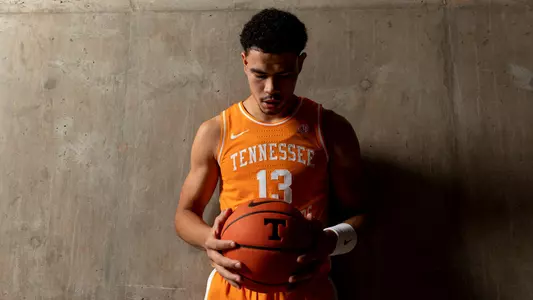 KNOXVILLE, TN - October 12, 2022 - Forward Olivier Nkamhoua #13 of the Tennessee Volunteers portrait taken during 2022 Photo Day at Thompson-Boling Arena in Knoxville, TN. Photo By Andrew Ferguson/Tennessee Athletics