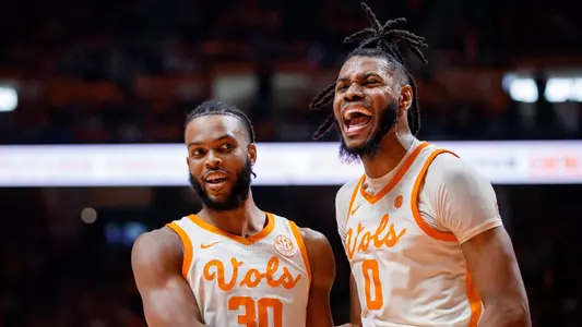 KNOXVILLE, TN - December 09, 2023 - Guard Josiah-Jordan James #30 and Forward Jonas Aidoo #0 of the Tennessee Volunteers during the game between the Illinois Fighting Illini and the Tennessee Volunteers at Food City Center in Knoxville, TN. Photo By Ian Cox/Tennessee Athletics