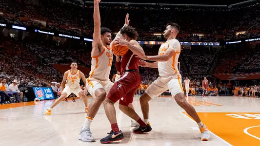 Tennessee defenders double-team an Alabama player during UT's 68-59 win on Feb. 15, 2023