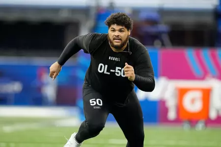 Tennessee offensive lineman Darnell Wright runs a drill at the NFL football scouting combine in Indianapolis, Sunday, March 5, 2023. (AP Photo/Darron Cummings)