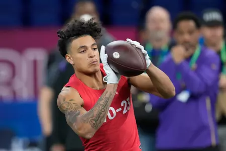 Tennessee wide receiver Jalin Hyatt runs a drill at the NFL football scouting combine in Indianapolis, Saturday, March 4, 2023. (AP Photo/Michael Conroy)