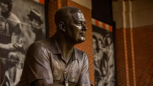 A bronze statue of Gen. Robert R. Neyland sits along the west exterior of Tennessee's football stadium, which bears his name.