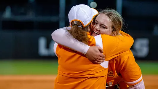 KNOXVILLE, TN - March 10, 2023 - Pitcher Ashley Rogers #14 and Head Coach Karen Weekly of the Tennessee Lady Volunteers during the game between the Ole Miss Rebels and the Tennessee Lady Volunteers at Sherri Parker Lee Stadium in Knoxville, TN. Photo By Kate Luffman/Tennessee Athletics