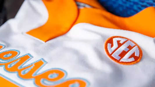 FAYETTEVILLE, AR - May 13, 2023 - SEC logo on white jersey before the 2023 SEC Softball Tournament Championship game between the South Carolina Gamecocks and the Tennessee Lady Volunteers at Bogle Park in Fayetteville, AR. Photo By Kate Luffman/Tennessee Athletics