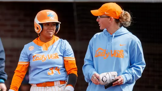 KNOXVILLE, TN - March 11, 2023 - Infielder/Catcher Destiny Rodriguez #34 and Volunteer Assistant Coach Kate Malveaux of the Tennessee Lady Volunteers during the game between the Ole Miss Rebels and the Tennessee Lady Volunteers at Sherri Parker Lee Stadium in Knoxville, TN. Photo By Ian Cox/Tennessee Athletics