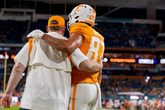MIAMI GARDENS, FL - December 30, 2022 - Head Coach Josh Heupel and Tight end Jacob Warren #87 of the Tennessee Volunteers before the 2022 Capital One Orange Bowl game between the Clemson Tigers and the Tennessee Volunteers at Hard Rock Stadium in Miami Gardens, FL. Photo By Andrew Ferguson/Tennessee Athletics