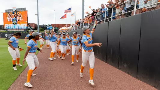 KNOXVILLE, TN - May 27, 2023 - The Tennessee Lady Volunteers celebrate after winning game two of the 2023 NCAA Softball Tournament Super Regional between the Texas Longhorns and the Tennessee Lady Volunteers at Sherri Parker Lee Stadium in Knoxville, TN. Photo By Andrew Ferguson/Tennessee Athletics