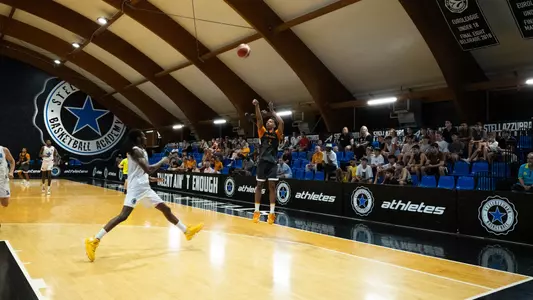 Jordan Gainey attempts a shot vs. A.S. Stella Azzurra in Rome, Italy.