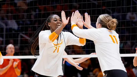 KNOXVILLE, TN - December 02, 2023 - Middle blocker Keondreya Granberry #77 and Setter Caroline Kerr #11 of the Tennessee Lady Volunteers during the second round game of the 2023 NCAA Women?s Volleyball tournament between the Western Kentucky Hilltoppers and the Tennessee Lady Volunteers at Food City Center in Knoxville, TN. Photo By Andrew Ferguson/Tennessee Athletics