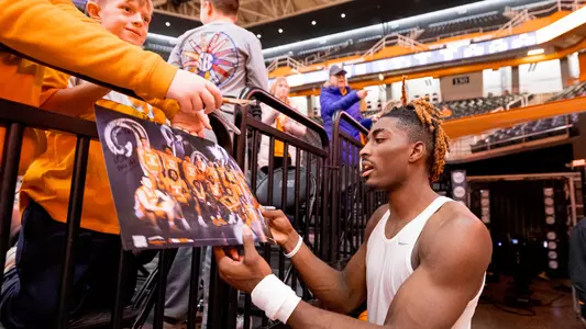 KNOXVILLE, TN - January 16, 2024 - Guard Jahmai Mashack #15 of the Tennessee Volunteers signs autographs after the game between the Florida Gators and the Tennessee Volunteers at Food City Center in Knoxville, TN. Photo By Andrew Ferguson/Tennessee Athletics