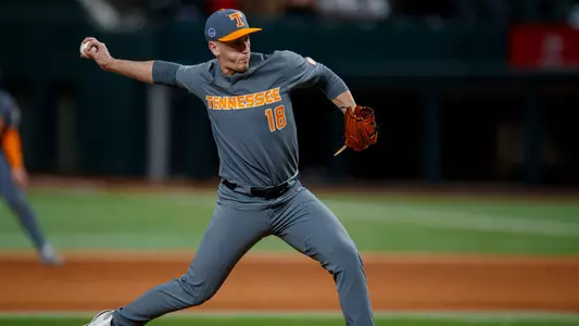 ARLINGTON, TX - February 16, 2024 - Pitcher AJ Causey #18 of the Tennessee Volunteers during the Shriners Children?s College Showdown game between the Texas Tech Red Raiders and the Tennessee Volunteers at Globe Life Field in Arlington, TX. Photo By Kate Luffman/Tennessee Athletics