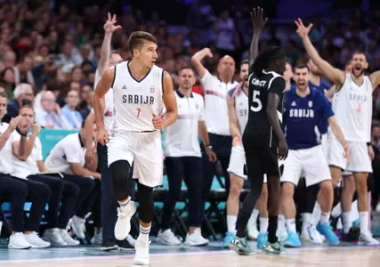 LILLE, FRANCE - AUGUST 03: Bogdan Bogdanovic #7 of Team Serbia reacts after a three point basket during a Men's basketball group phase-group C game between Serbia and South Sudan on day eight of the Olympic Games Paris 2024 at Stade Pierre Mauroy on August 03, 2024 in Lille, France. (Photo by Gregory Shamus/Getty Images)