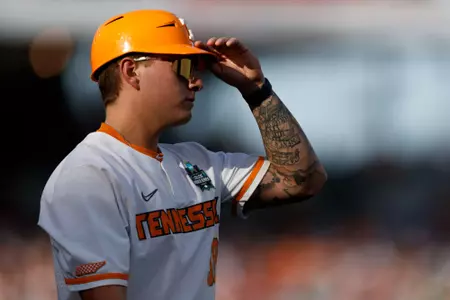 OMAHA, NE. - June 14, 2024 - Student Assistant Coach Parker Serrano of the Tennessee Volunteers during the 2024 Baseball College World Series game between the Florida State Seminoles and the Tennessee Volunteers at Charles Schwab Field in Omaha, NE. Photo By Ian Cox/Tennessee Athletics