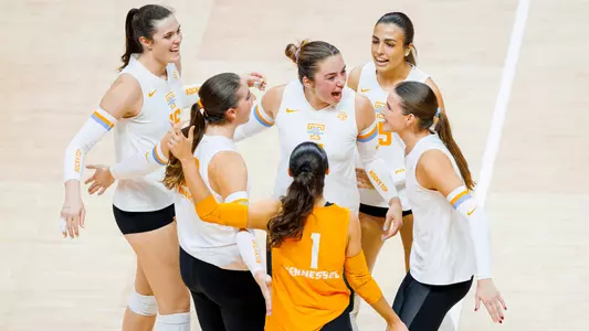 Lady Vols Celebrate Point in Home Match Against Georgia